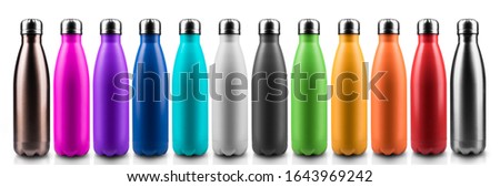 Colorful reusable stainless thermo bottles for water or another liquid with closed cap. Steel eco bottle. Plastic free. Isolated on white background. Royalty-Free Stock Photo #1643969242
