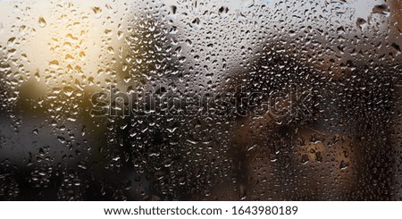 Water droplets in the house glass