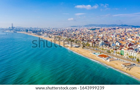 Beautiful Blue Sky and Badalona Spain Coast and Beach. Aerial view Royalty-Free Stock Photo #1643999239