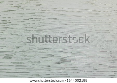 Wood with a natural texture, panels with a mint green effect. Natural background. Material in trendy soft pastel color, new modern style. Close-up photo.