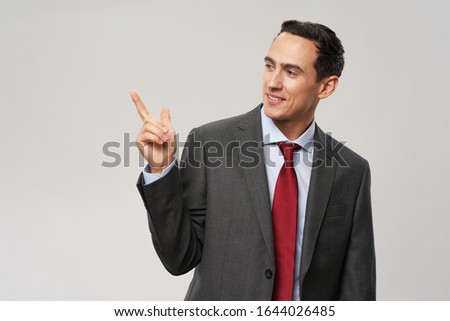 Business man in an elegant style suit self-confidence emotions official