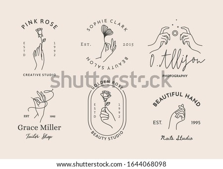 A set of women's hand logos in a minimalistic linear style. Vector design of sign templates or emblems in various gestures. For photographer, beauty Studio, Spa, tailor shop,embroidery, nail Studio Royalty-Free Stock Photo #1644068098