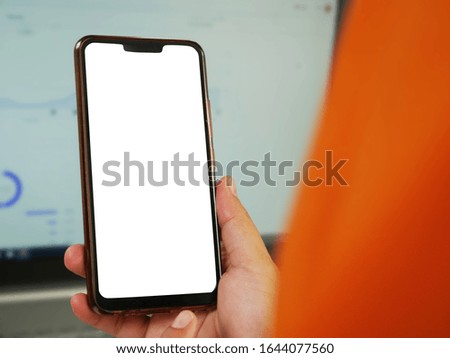 Close up image of smart phone mockup, businessman holding phone with white screen template