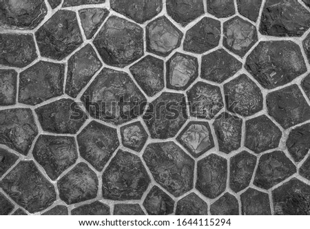 Abstract dark gray stone background,stone wall texture for interior design.