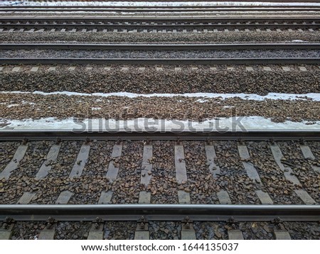 railway rails at the station in the winter season