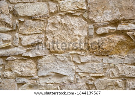Fragment of an old wall in the village of Omodos. Cyprus