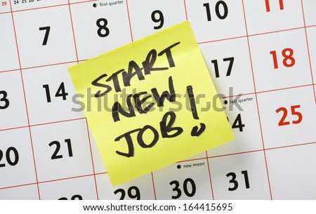 Hand written reminder to Start New Job on a yellow post it note stuck to a calendar background Royalty-Free Stock Photo #164415695