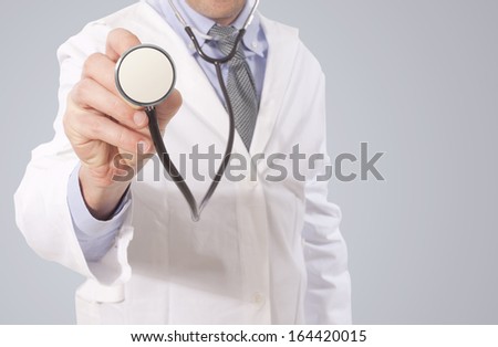 doctor point stethoscope and make diagnosis Royalty-Free Stock Photo #164420015