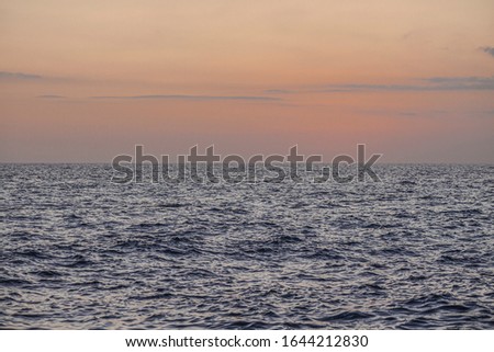 Sunset over the sea in the caribbean in Dominicus beach in Dominican Republic
