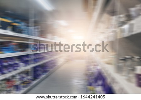 Blurred background of the mall, industrial store hall out of focus