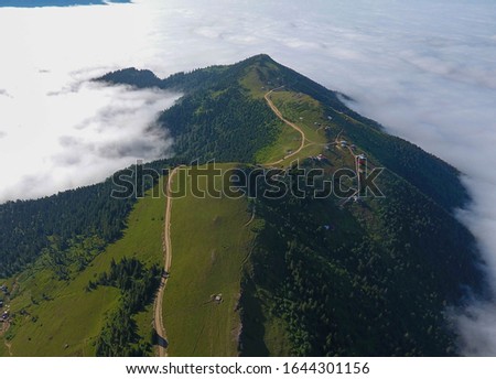 foggy high and green mountains