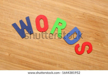 word Words from wooden letters on a wood background