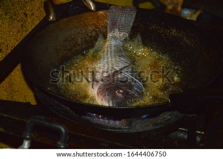 Picture of Fried Fish in Boiling Oil