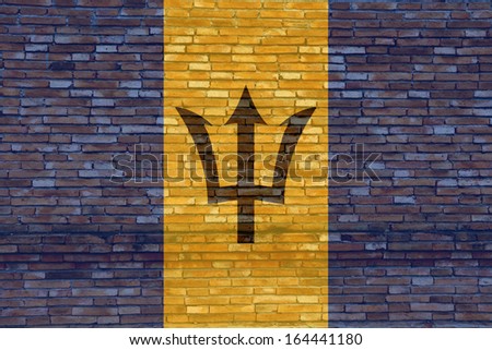 Barbados flag on texture brick wall. 