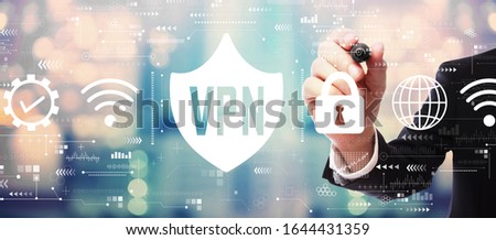 VPN concept with businessman on blurred abstract background