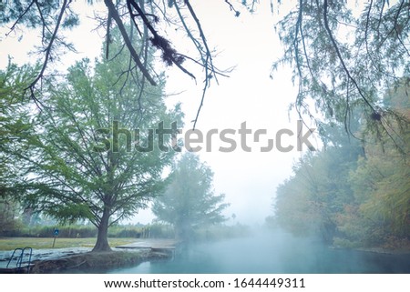 Hot Spring, Blurred photo of morning fog over a lake in cold autumn weather in half moon san luis potosi