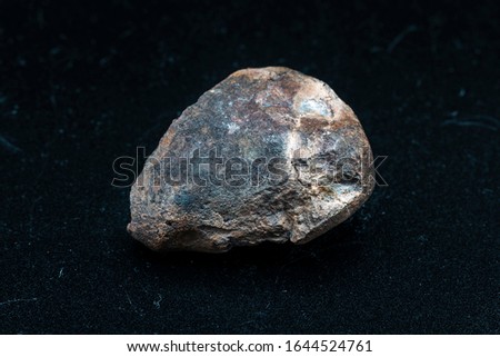 Chondrite Meteorite L Type isolated, piece of rock formed in outer space in the early stages of Solar System as asteroids. This meteorite comes from an asteroid fall impacting Earth at Atacama Desert