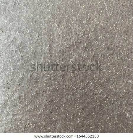 The surface of the concrete floor