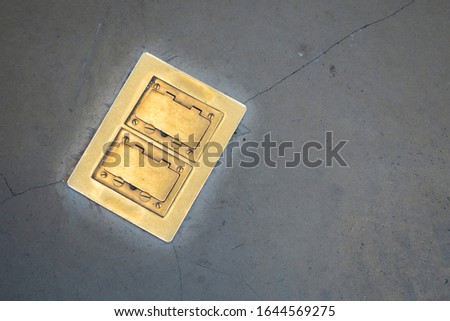 2 concrete floor brass office door duplex plug outlet sockets, business 