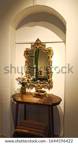 Wall mirror and vintage table traditional wood carving