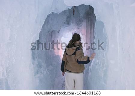
Photographing a woman walking in the ice