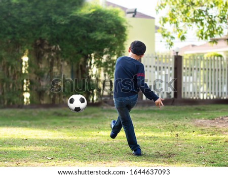 Youth move soccer practice drills with cones. Soccer drills: slalom drill. Young football players training on pitch