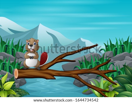A beaver standing at the trunk above the flowing river