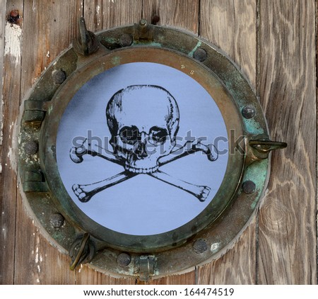 Skull and Crossbones On Blue Background As Seen Through A Rustic Old Porthole
