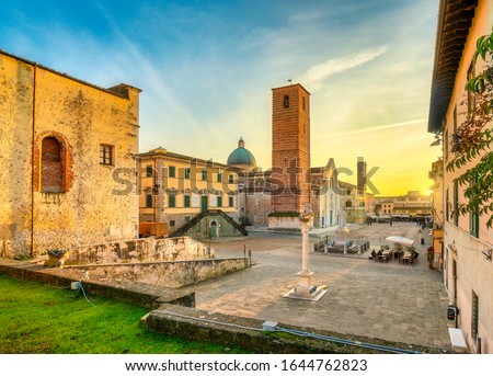 Pietrasanta old town view at sunset, San Martino cathedral and torre civica. Versilia Lucca Tuscany Italy Europe Royalty-Free Stock Photo #1644762823