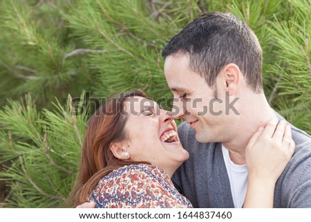 portraits of happy couple outdoors