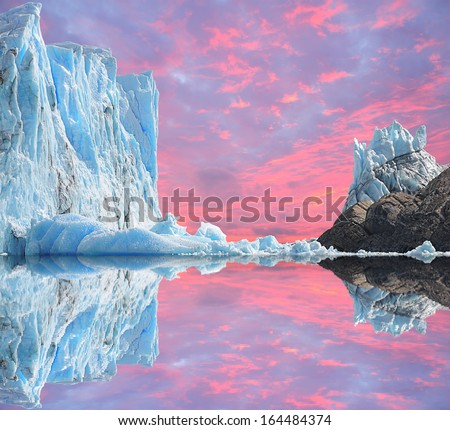 Sunset sky above Perito Moreno glacier. Argentina. Royalty-Free Stock Photo #164484374