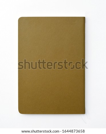 Top view of closed stitch blank recycled paper cover notebook on white background additional clipping path.