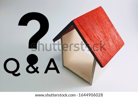 Question mark with model house, Problem Concept.