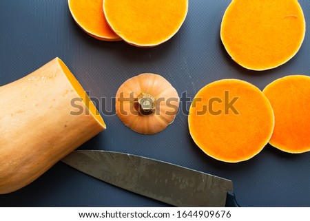 close up of pumpkin squash on a dark background in studio