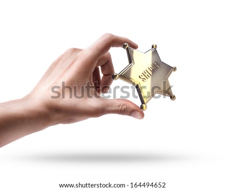 hand holding Golden Sheriff Star isolated on white background High resolution 3d 