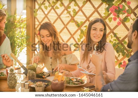 Young couples eating brunch and drinking smoothie bowl at vintage bar - Happy people in trendy restaurant - Food trends and love concept - Image