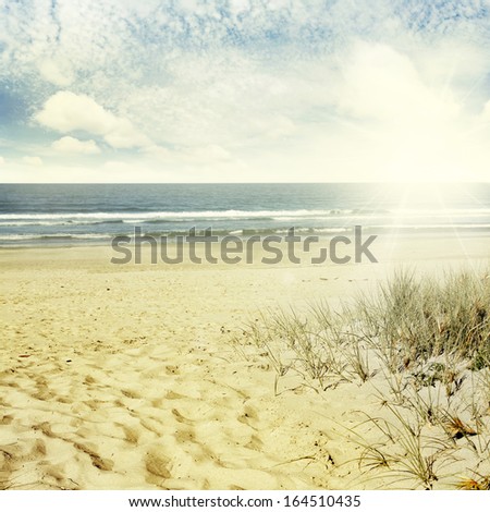 Sand, water and sky beach scenery