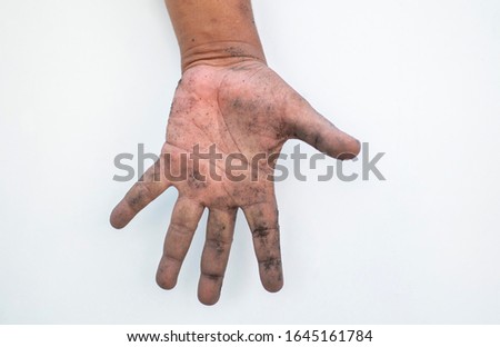 The dirty palms and fingers of the elderly show gestures on a white background.