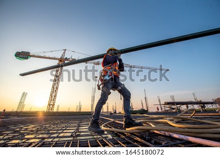 A construction worker at construction site Royalty-Free Stock Photo #1645180072