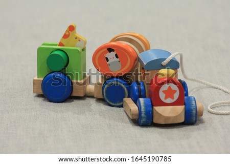 Images of cartoon train models A variety of beautiful colors made of wood