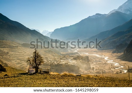 Marshyangdi river valley near Manang village in sunny morning. View from trekking route to Torung La, Annapurna circuit trek, Nepal.