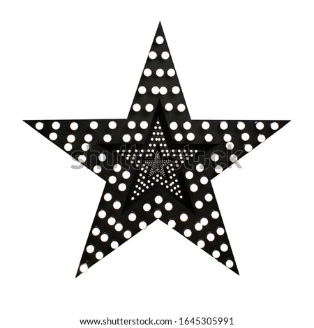 Photo an isolated decorative star with lamps, a huge star with a garland, a black star studded with burning bulbs, a decorative luminous star, the light is on.Decor Studio
