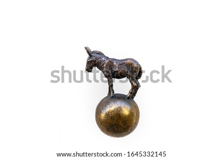 A donkey on a ball