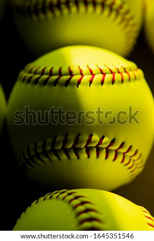 Close up of a fast pitch softball