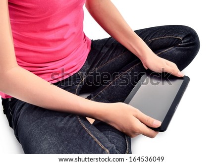 a woman using a tablet computer, isolated on white background