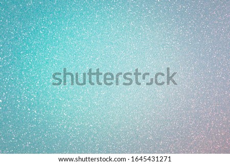 Sparkling turquoise background, abstract christmas glitter