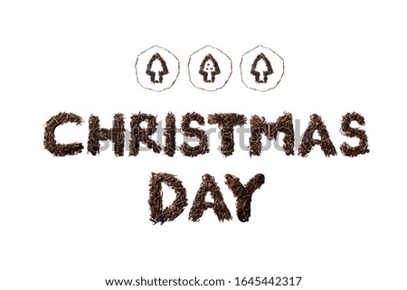 Christmas Day quote and christmas tree made with dried tea leaves placed on white background from the top view has space for your messages