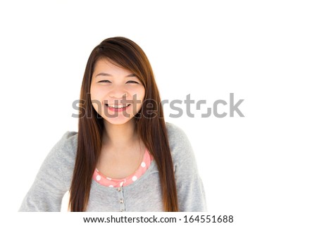 round face and white skin thai hairy woman with gray coat is smiling on white background (Blank area at right side) Royalty-Free Stock Photo #164551688