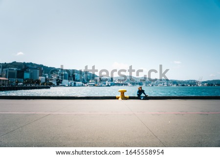 Blur image of Wellington City waterfront view in the capital of New Zealand