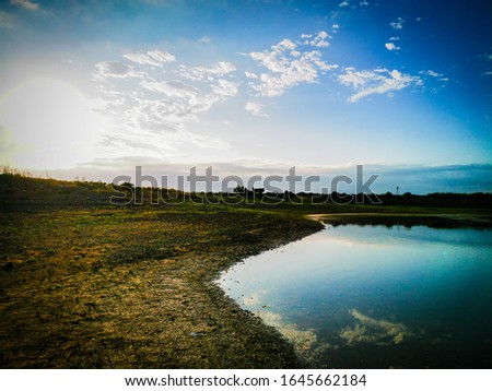 Beautiful Sunrise in South African lake with blue sky